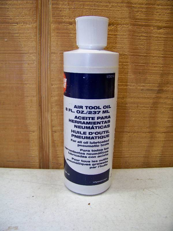 lot 726 image: 12 Bottles CH Air Tool Oil