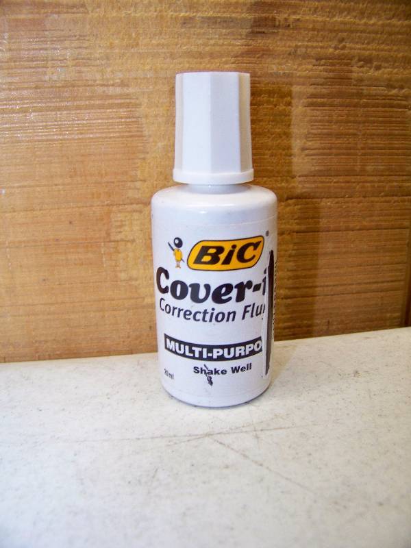 lot 825 image: 25 Bottles Bic Cover It Correction Fluid