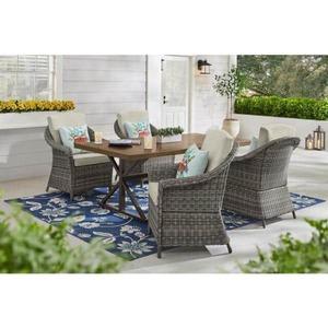 lot 68798 image: Hampton Bay - Chasewood Brown Wicker Outdoor Patio Captain Dining Chair with CushionGuard Biscuit Cushions (Set of 2) - Retail $479.99