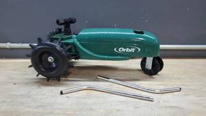 lot 33688 image: Orbit Rotating Traveler Lawn Sprinkler