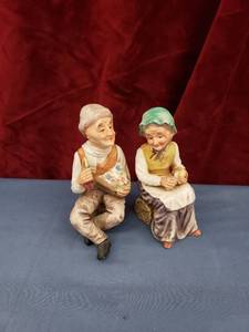 lot 6032 image: marked manwoman figurines