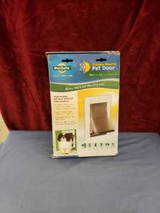 lot 6233 image: extreme weather pet door in box