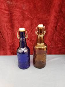 lot 6410 image: pair old lock top bottles