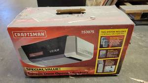 lot 40275 image: Contents of Shelf - Garage Door Opener System, Dewalt DW987 Cordless Drill  Driver, Panasonic Microwave, and More