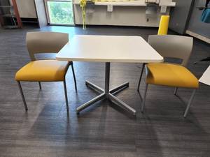 lot 29747 image: White Top Square Table with 2 Yellow Chairs
