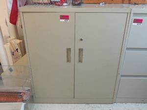lot 40191 image: Steelcase Metal 2 Door Cabinet Contents Included