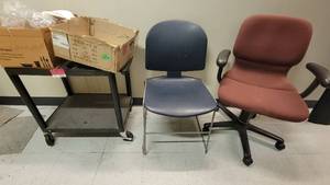 lot 40261 image: 2-Tier Plastic Cart W a Rolling Office Chair and a Blue Plastic Waiting Room Chair