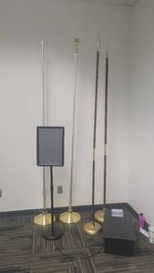 lot 49197 image: 7ft 7in Flag Poles and a Display W Adjustable Heights