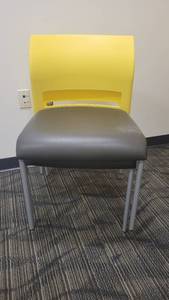 lot 45033 image: Lot of 2 Yellow Steelcase Chairs W a Black Leather Cushion