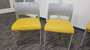 lot 45044 image: Lot of 2 Gray Steelcase Chairs W a Yellow Cushion Seat