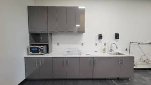 lot 22628 image: Upper and Lower Cabinetry W an Elkay Stainless Steel Sink