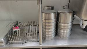 lot 44543 image: Lot of 2 Cutting Board Racks and a Varitey of Stainless Steel Soup Well Pans