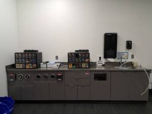 lot 44531 image: Charcoal Grey Coffee Station Cabinetry with Speckled Grey Granite Top