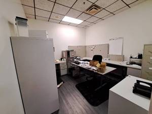 lot 44538 image: Entire Office Contents ( Filing Cabinet 2 Desk  Safe Filing Cabinet  Metal Storage and 6 Ft Table on Wheels  Lot of Office Supplies