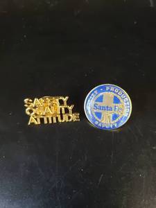 lot 1689 image: pair Santa Fe safety Lapel pins
