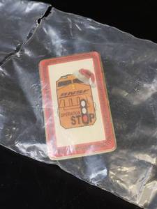 lot 1695 image: BNSF Christmas Lapel pin factory sealed