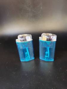 lot 1721 image: pair retro turquoise lighters