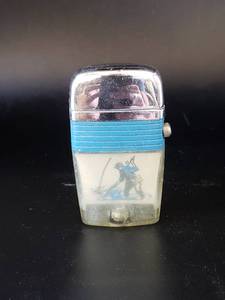 lot 1722 image: retro fly fishing lighter