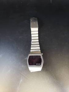 lot 1724 image: Saturn digital watch