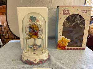lot 3002 image: Winnie the Pooh anniversary clock