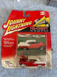 lot 3087 image: Johnny lighting 1955 Chevy
