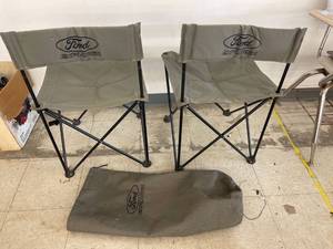 lot 3149 image: bag with 2 Ford Explorer chairs