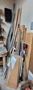 lot 4062 image: Contents in Corner of Garage - Wood, Metal, and Signs