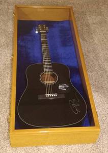 lot 3011 image: Fender Advance Acoustics Signed Guitar in Wooden Display Case - Rick Springfield - Guitar was a Prize from a Casino where the Artist was Playing at