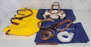 lot 1665 image: (2) Dooney and Bourke Purses with Dust Covers and Extra Handles