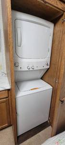 lot 1720 image: GE Unitized Spacemaker 3.8 cu. ft. Capacity Washer with Stainless Steel Basket and 5.9 cu. ft. Capacity Electric Dryer - ON MAIN LEVEL OF HOUSE