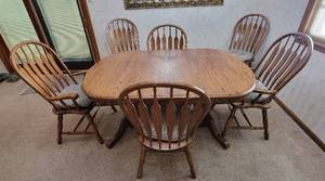 lot 1004 image: Solid Wood Dining Room Table with 6 Chairs with 2 Leaves that store in Table (18 Wide each) - 60 x 42 x 29 without leaves