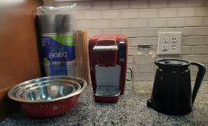 lot 1743 image: Red Keurig Coffee Maker, Keurig Carafe, Stainless Bowl Set, Atlas Jar and Dixie Disposable Coffee Cups