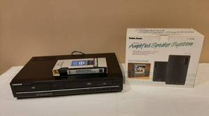 lot 3064 image: Samsung DVDVCR Combination Model V9650 and Radio Shack Amplified Speaker System 40-1361
