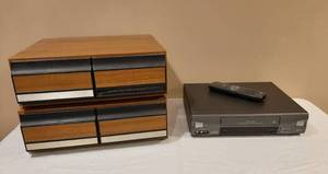 lot 3065 image: Toshiba VCR - Model M-674 and VHS Storage Drawers with VHS Tapes