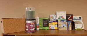 lot 3084 image: CDs, My Passport Electronic Keeper and Storage Bin