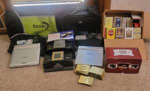 lot 514 image: Playing Cards, Card Shufflers, Portable DVDCD Players (Not Tested) and Duffle bags