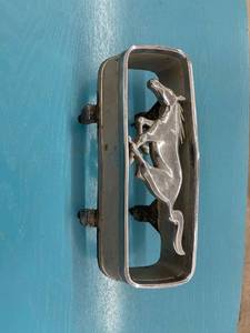 lot 11 image: 1960s Mustang emblem
