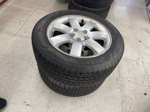 lot 23 image: 2 Goodyear assurance 22555r17 tires of ford wheels