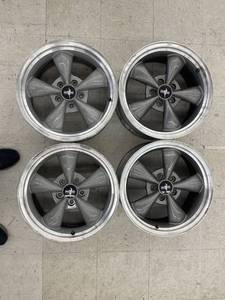 lot 25 image: 4 17x8 mustang wheels