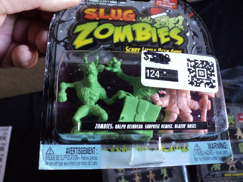lot 5092 image: (24) ct lot SLUG Zombie Figurines packaged for resale or use