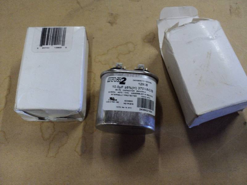 lot 5114 image: (2) ct. lot Mars 2 Motor Run Capacitor 12908