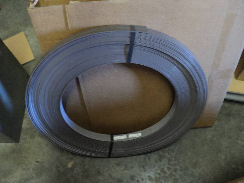 lot 5142 image: (2) rolls of Dolken Vaneer Edge, Graphite Pear, approx 100 feet per roll