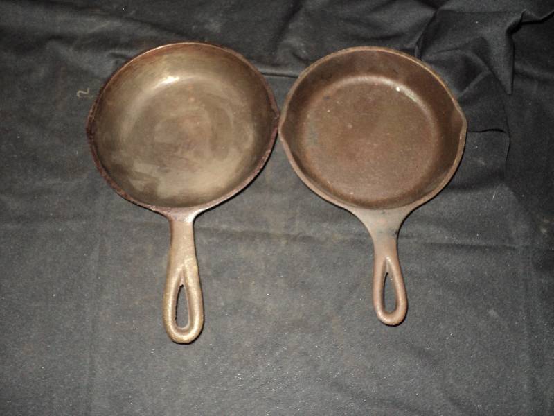 lot 5166 image: (2) small cast iron skillets, 6-58 diameter & 7 diameter