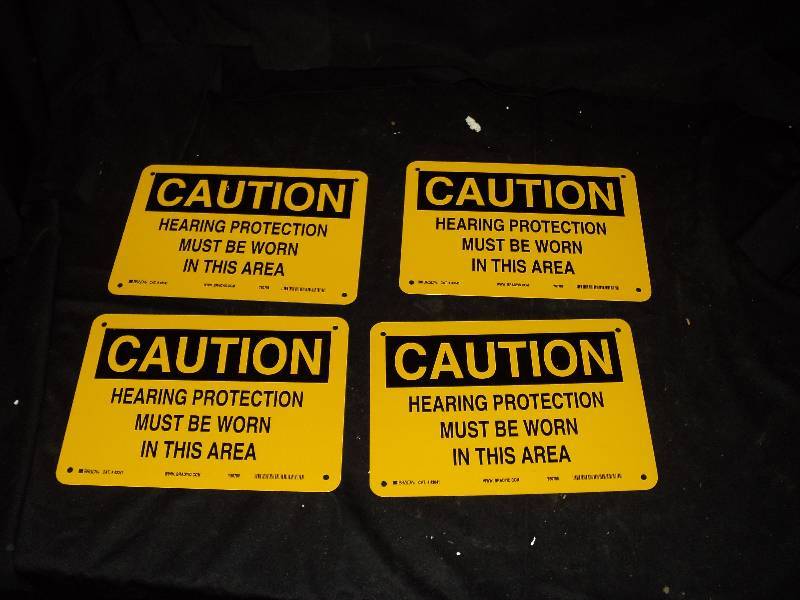lot 5202 image: (4) ct. lot Brady Cat # 43041 Caution Hearing Protection Must Be Worn In this area signs, 10 x 7 Aluminum B-555