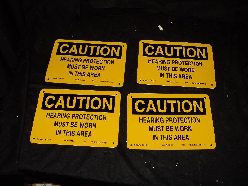 lot 5203 image: (4) ct. lot Brady Cat # 43041 Caution Hearing Protection Must Be Worn In this area signs, 10 x 7 Aluminum B-555
