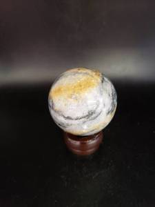 lot 1946 image: big marble ball on stand