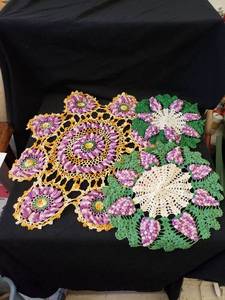 lot 2030 image: hand sewn purple doilies