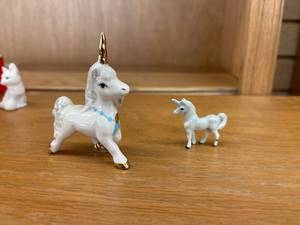 lot 4947 image: 1 ceramic & 1 metal unicorn