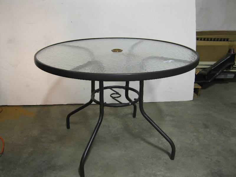 lot 1967 image: Round Glass Patio Dining Table