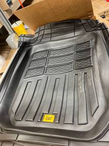 lot 104 image: CAT floor mats and trunk mat